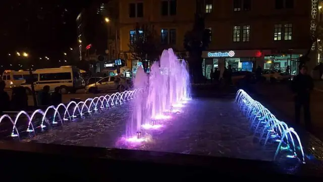 Linear fountain with violet LED lighting