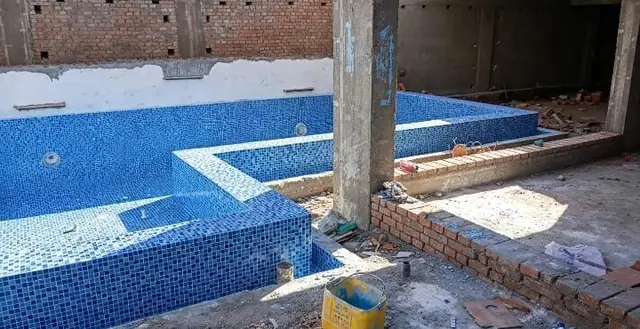 Basin after mosaic lining, before surrounding works