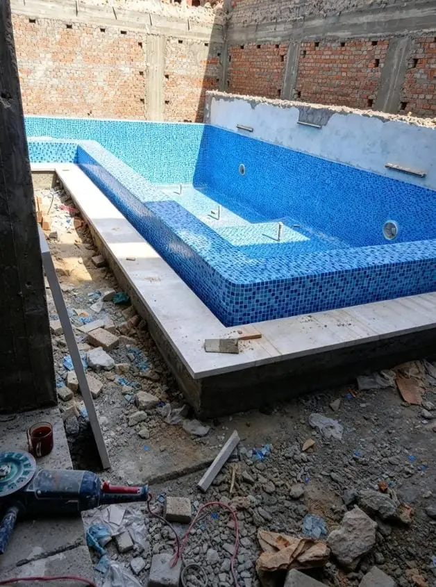 Mosaic and coping installation