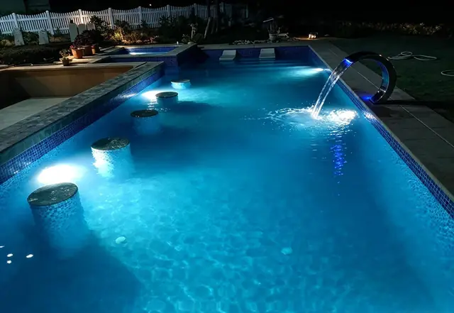 Night view: underwater lighting and water jets