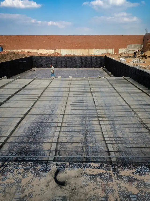 Base-slab reinforcement for the semi-Olympic pool