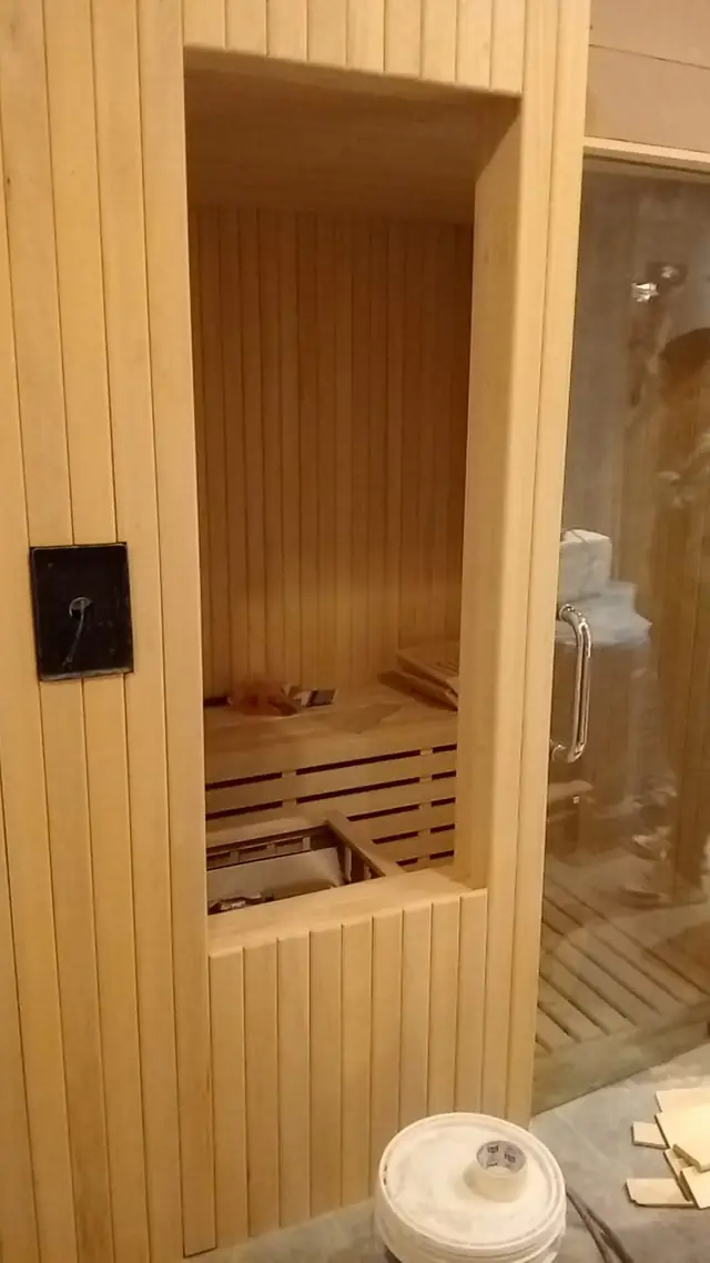 Sauna door frame and control panel