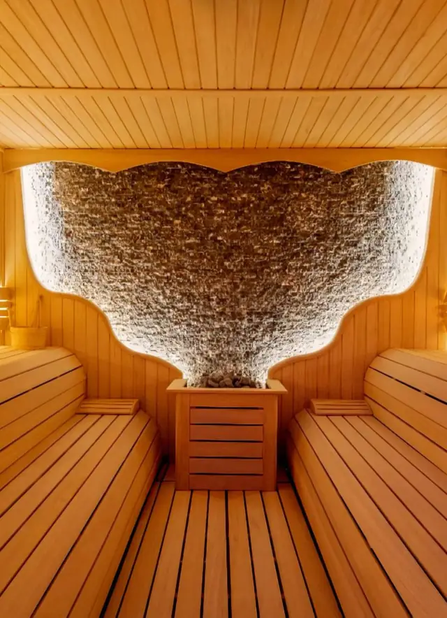 Concept: sauna with illuminated stone feature wall