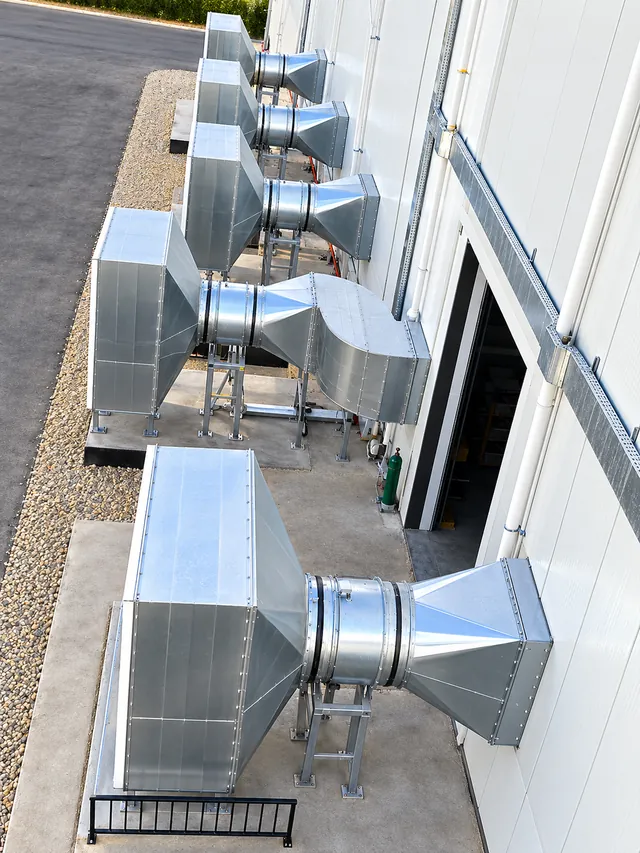 Ventilation duct connections along an external wall