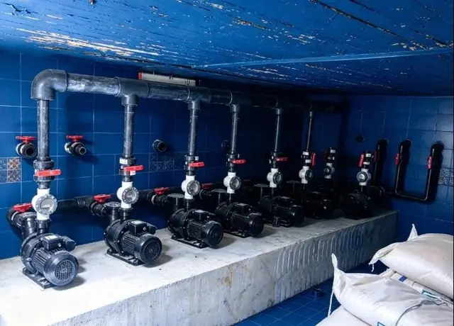 Circulation pump row with valves and gauges